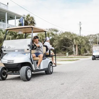 a person riding on the back of a truck