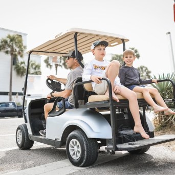 a person riding on the back of a truck