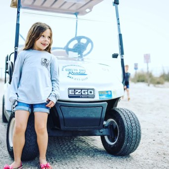 a person standing in front of a truck