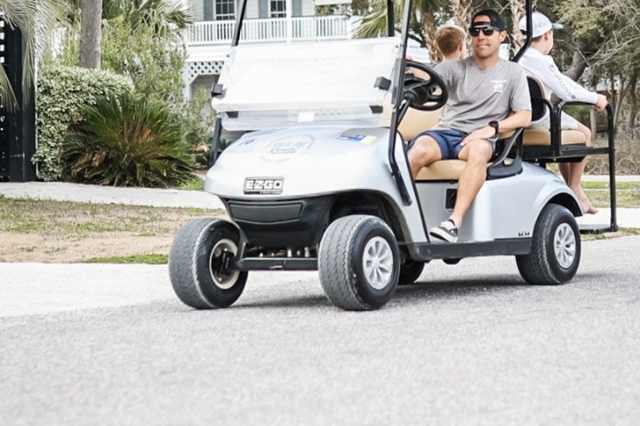 a person riding on the back of a truck